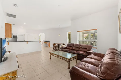 a bed room with a bed and a window