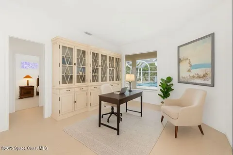 a kitchen with cabinets and stainless steel appliances