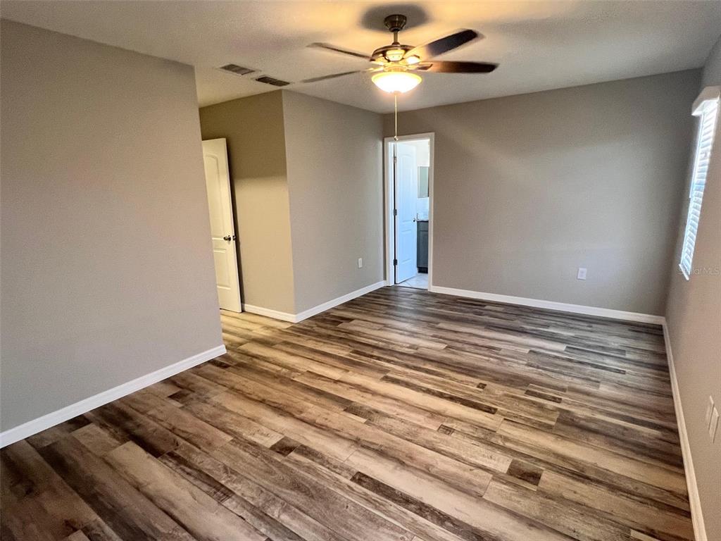 4317 Chipmunk Drive New Port Richey, FL 34653 - Photo 11 of 23 a view of an empty room with a window