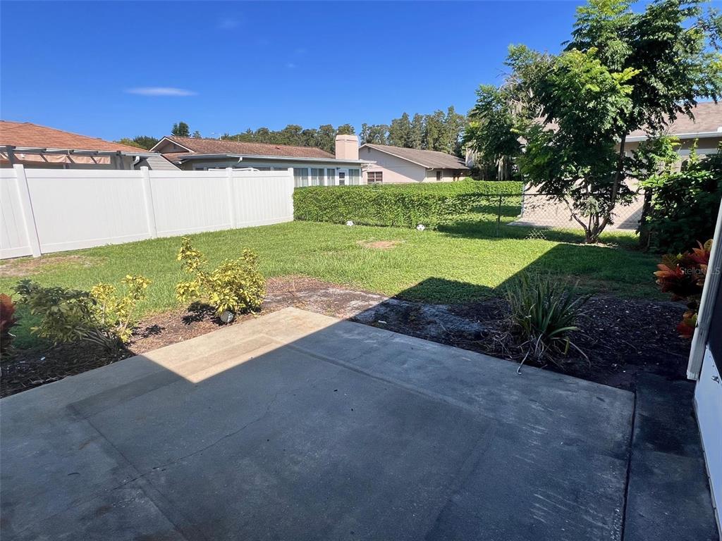 4317 Chipmunk Drive New Port Richey, FL 34653 - Photo 20 of 23 a view of an outdoor space and a yard