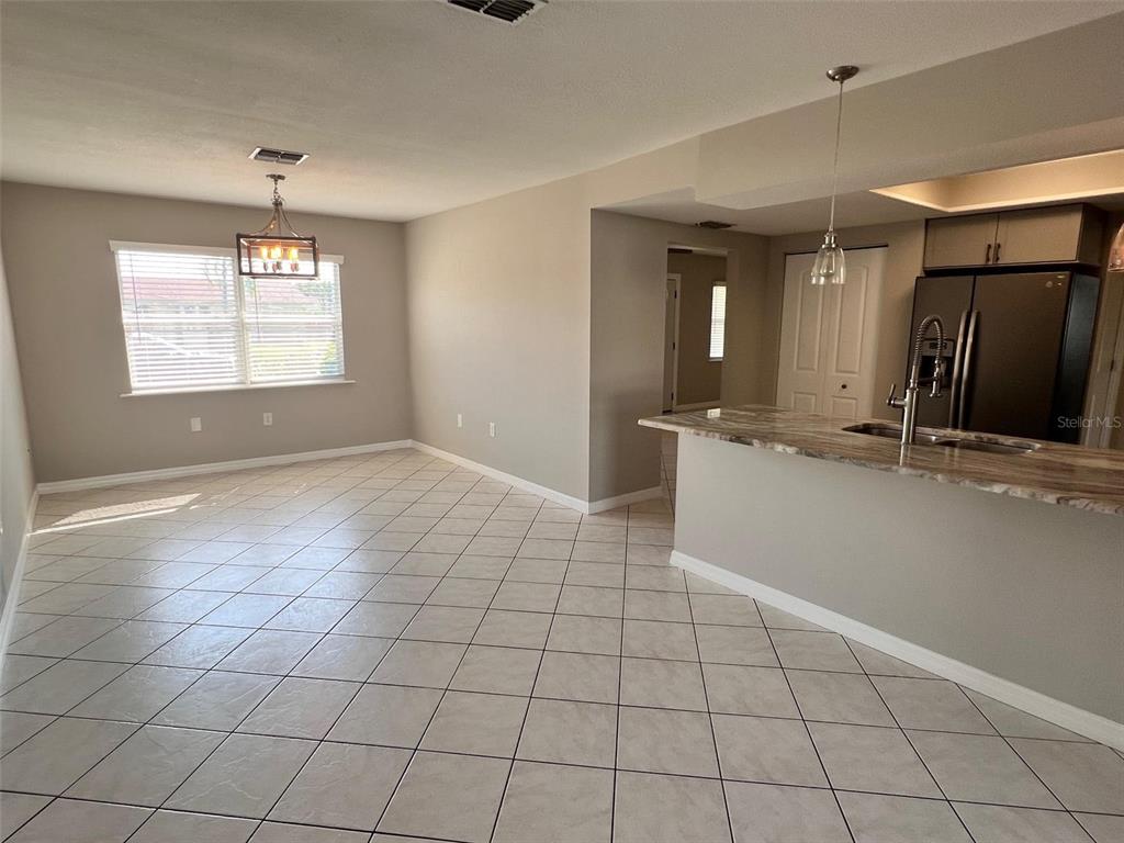 4317 Chipmunk Drive New Port Richey, FL 34653 - Photo 9 of 23 a view of an empty room with window and bathroom