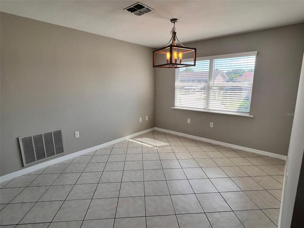 4317 Chipmunk Drive New Port Richey, FL 34653 - Photo 10 of 23 a view of an empty room with a window