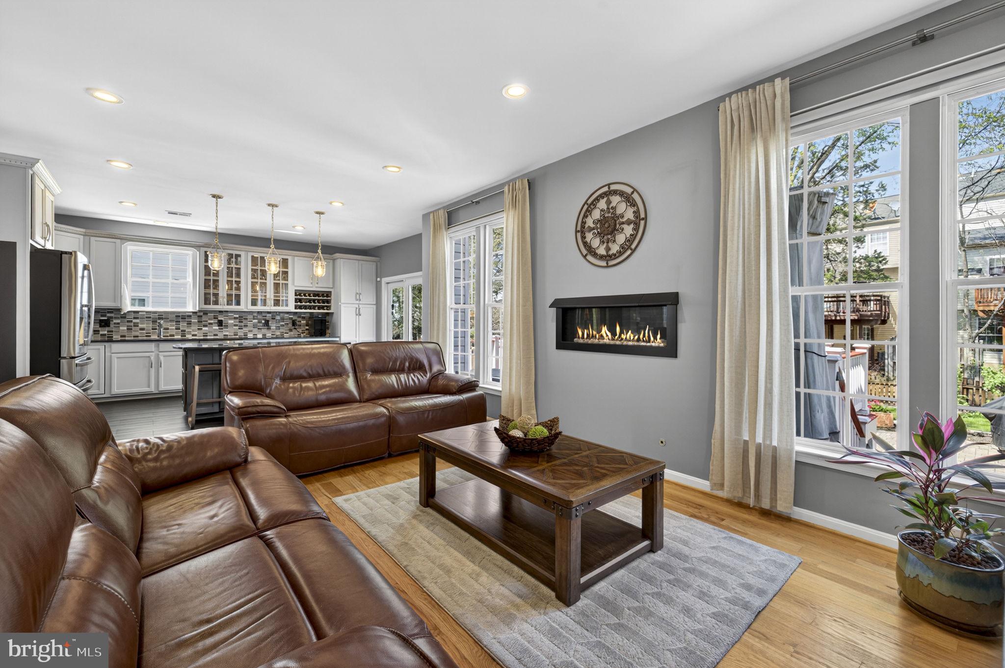 43200 Lighthouse Place Chantilly, VA 20152 - Photo 12 of 47 a living room with furniture and a table