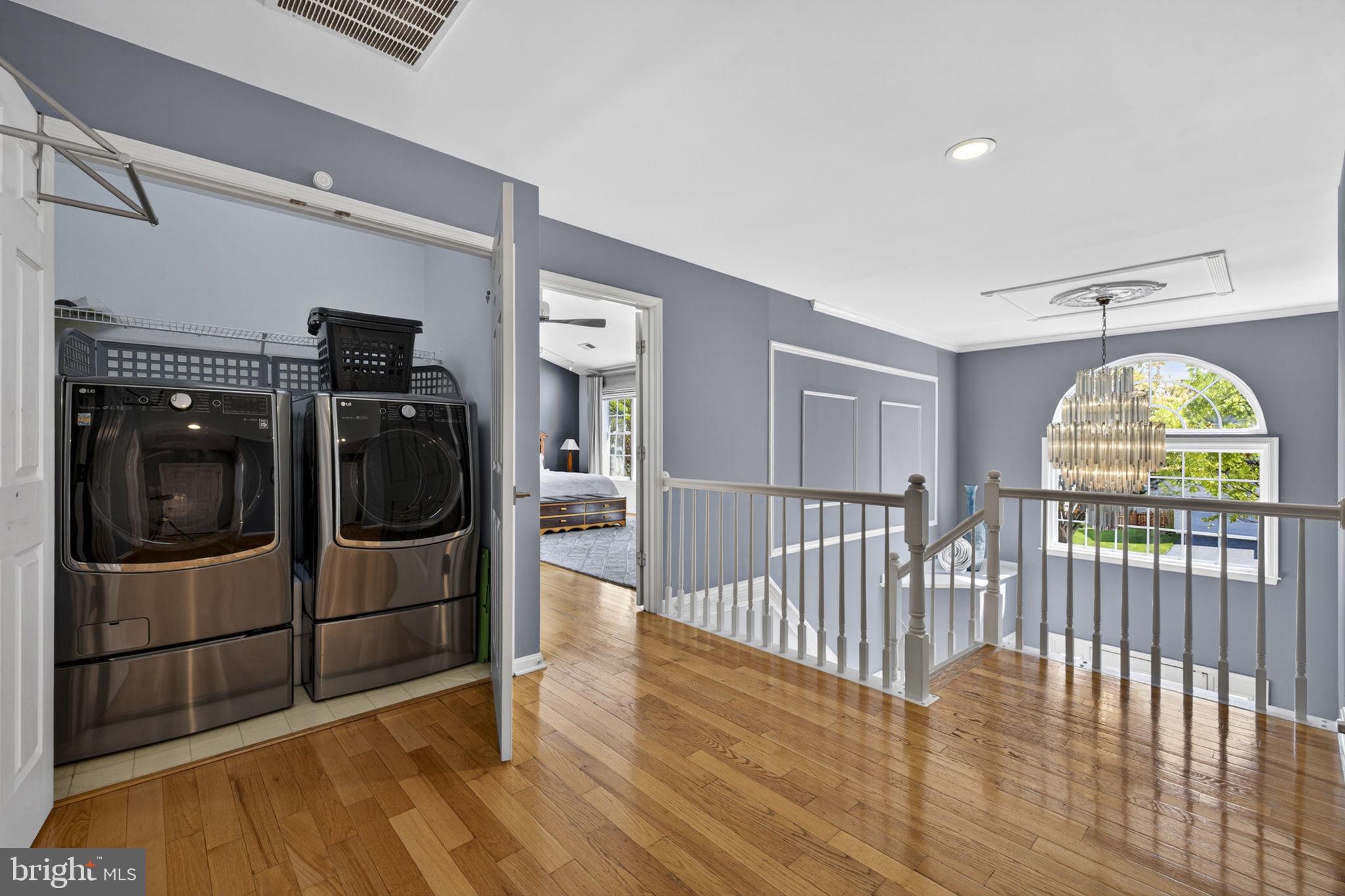 43200 Lighthouse Place Chantilly, VA 20152 - Photo 20 of 47 a view of a hallway with wooden floor and windows