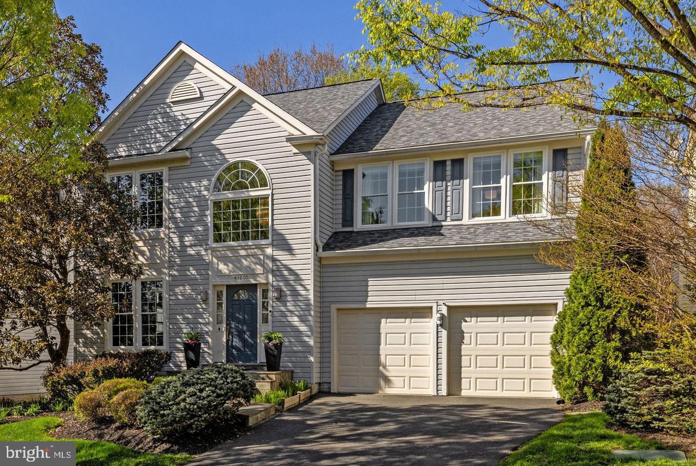 43200 Lighthouse Place Chantilly, VA 20152 - Photo 2 of 47 a view of a house with a yard and potted plants