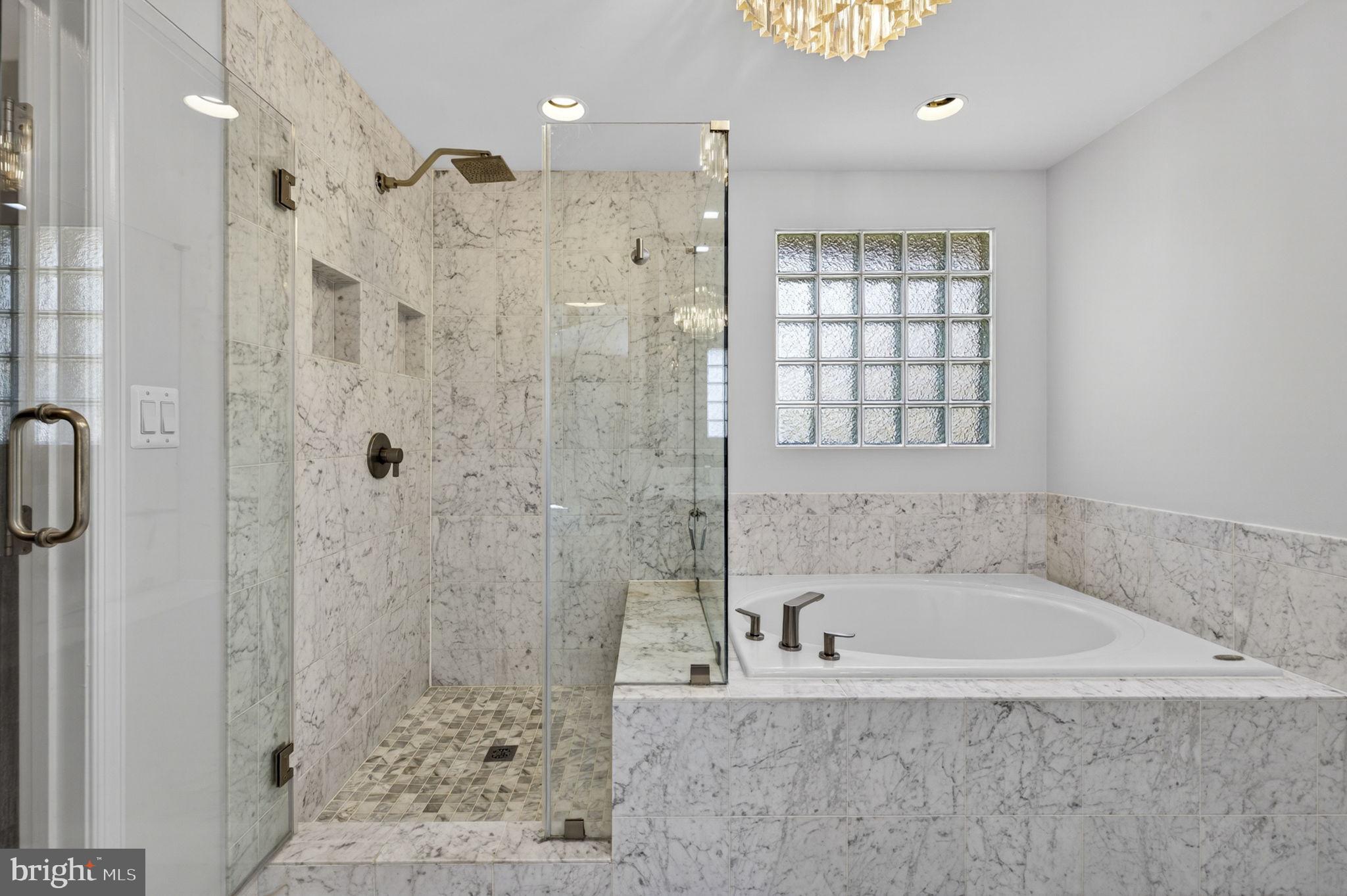 43200 Lighthouse Place Chantilly, VA 20152 - Photo 25 of 47 a white bath tub sitting next to a shower