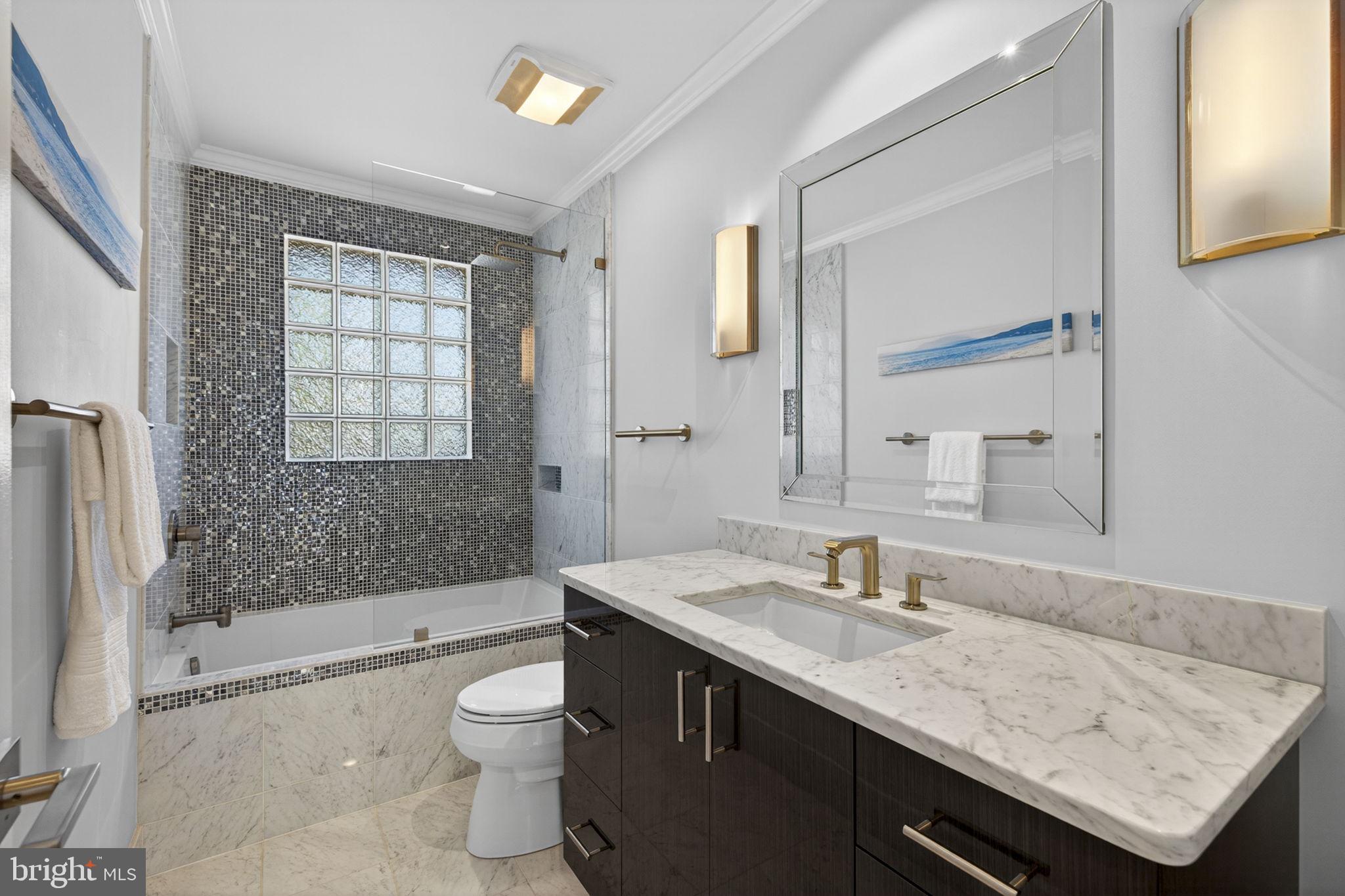 43200 Lighthouse Place Chantilly, VA 20152 - Photo 30 of 47 a bathroom with a granite countertop sink toilet and shower