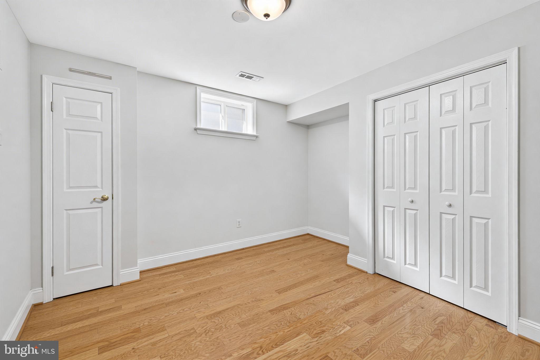 43200 Lighthouse Place Chantilly, VA 20152 - Photo 31 of 47 a view of an empty room with wooden floor