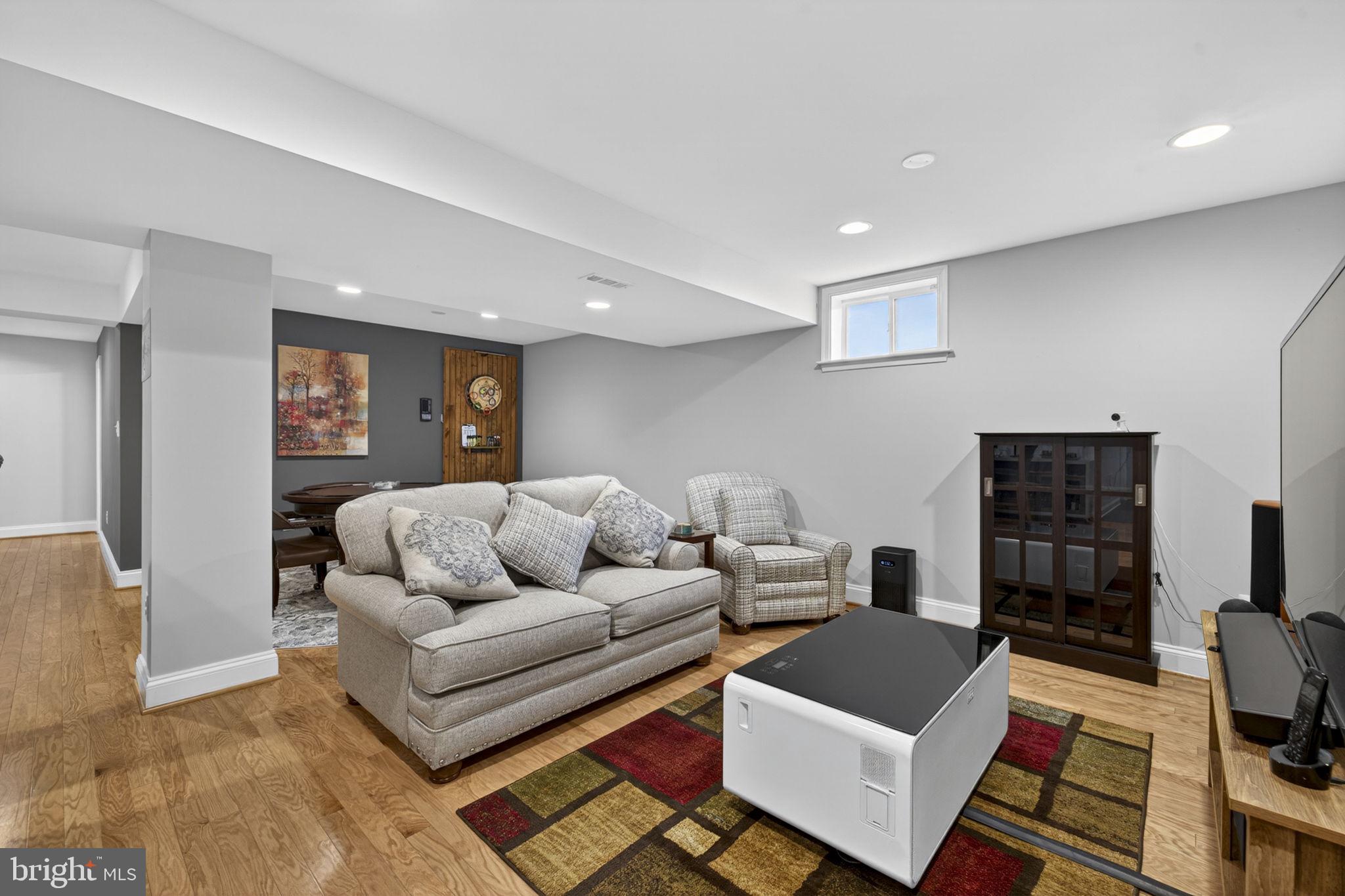 43200 Lighthouse Place Chantilly, VA 20152 - Photo 33 of 47 a living room with furniture and a couch