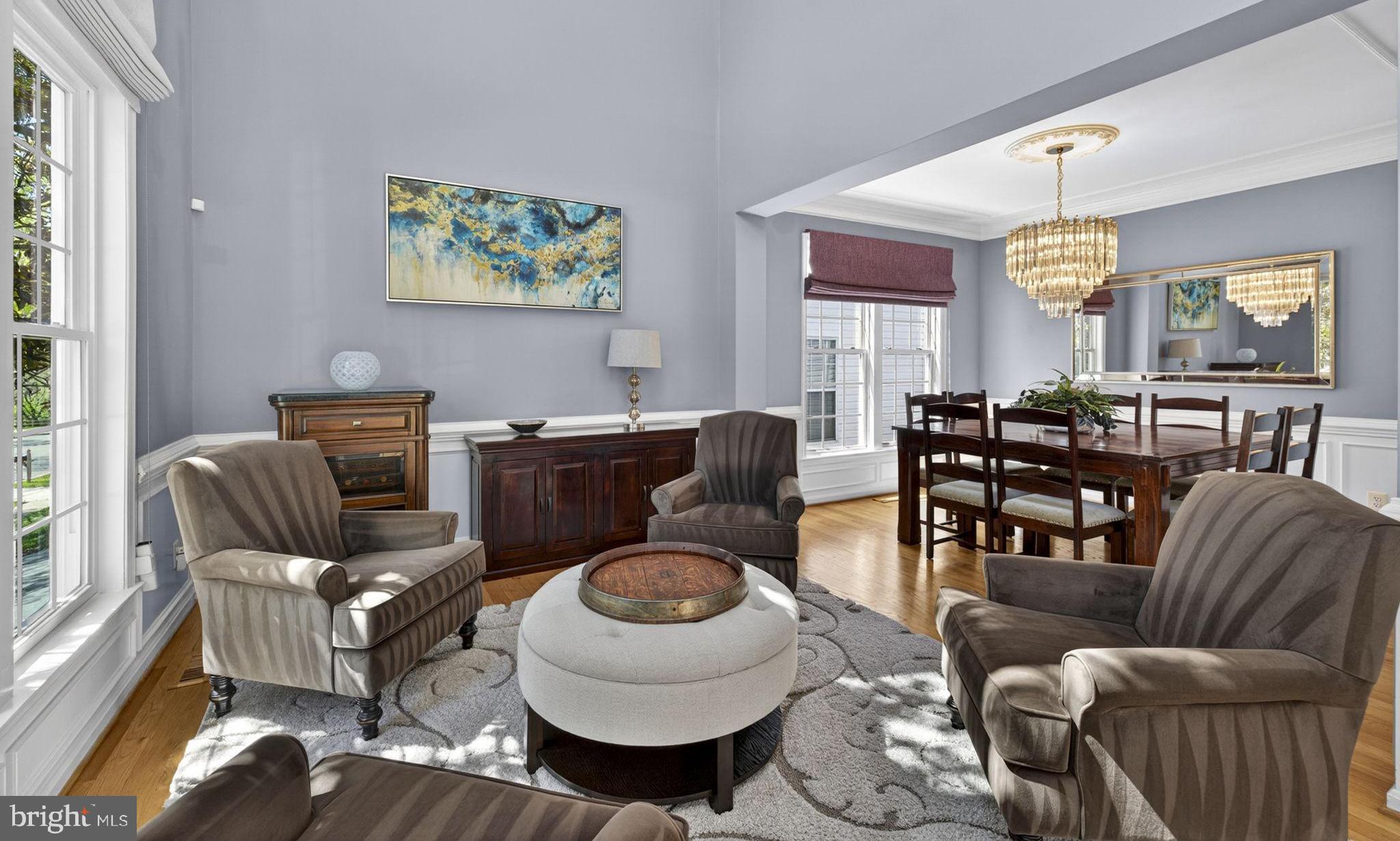 43200 Lighthouse Place Chantilly, VA 20152 - Photo 5 of 47 a living room with furniture a window and a chandelier