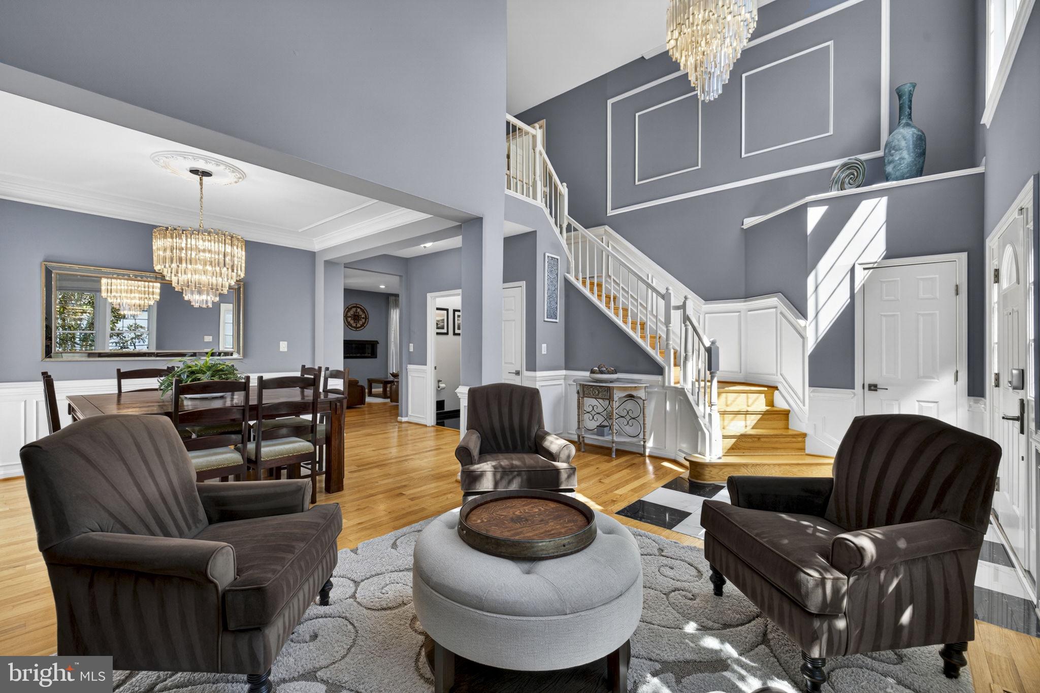 43200 Lighthouse Place Chantilly, VA 20152 - Photo 6 of 47 a living room with furniture and a large window