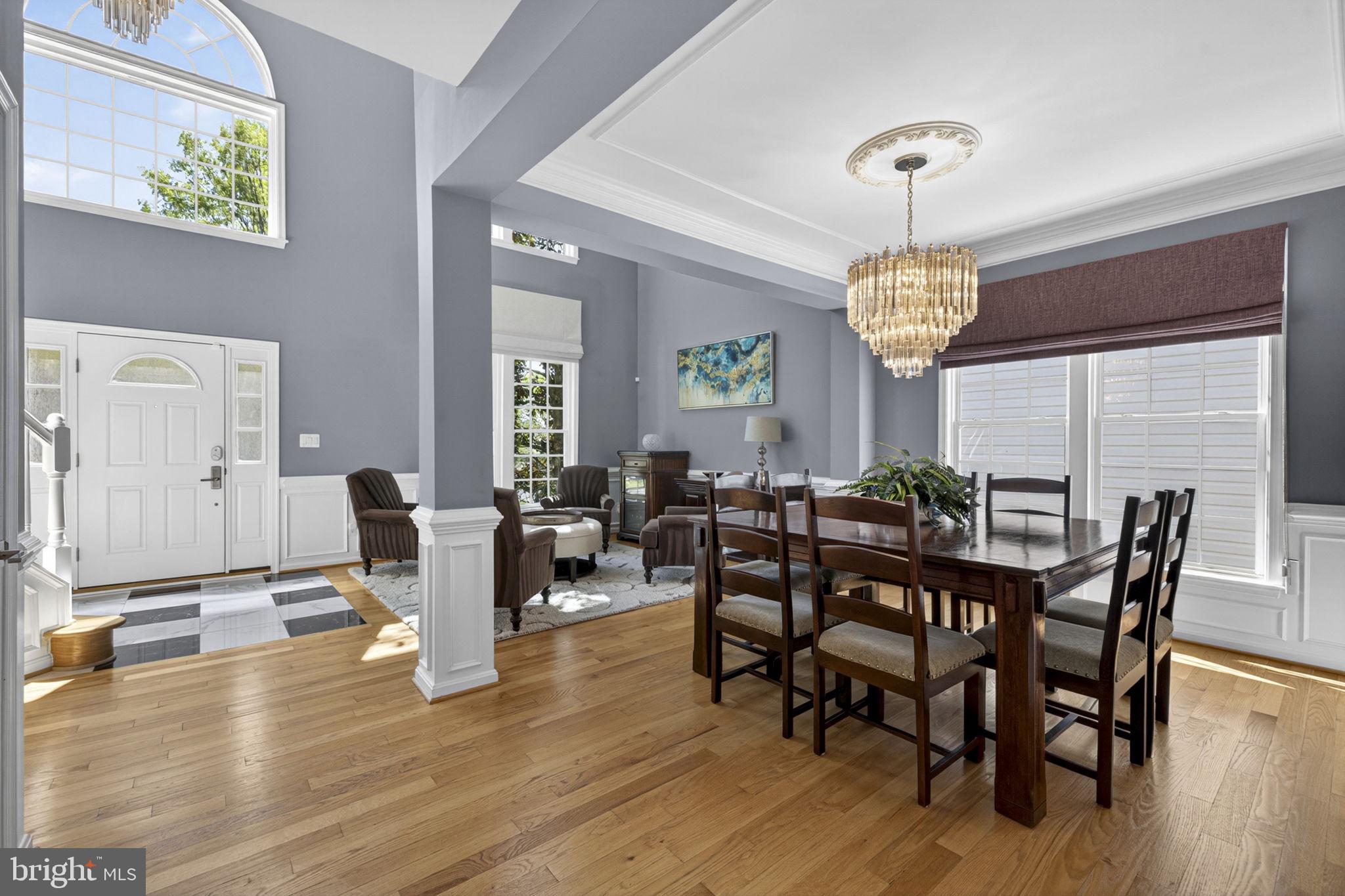 43200 Lighthouse Place Chantilly, VA 20152 - Photo 8 of 47 a view of a dining room with furniture window and wooden floor