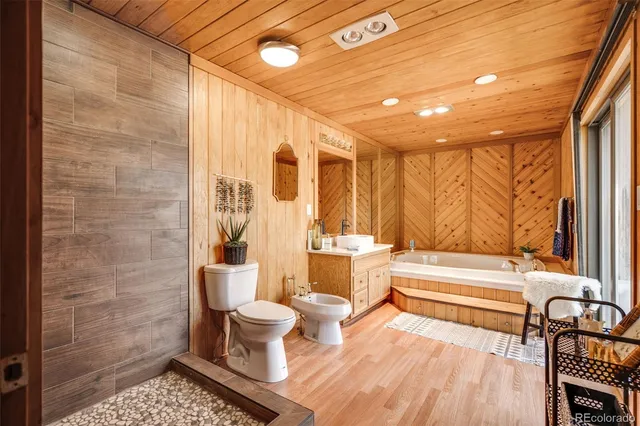 a bathroom with a bathtub and a sink