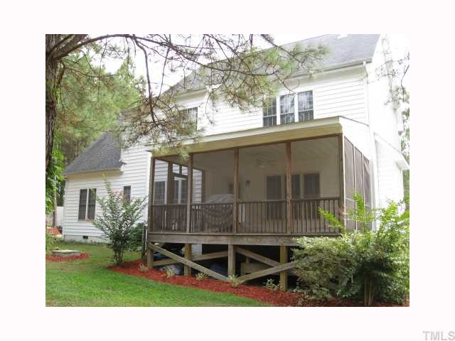 2912 Candlehurst Lane Raleigh, NC 27616 - Photo 12 of 12 a view of a house with a yard and potted plants