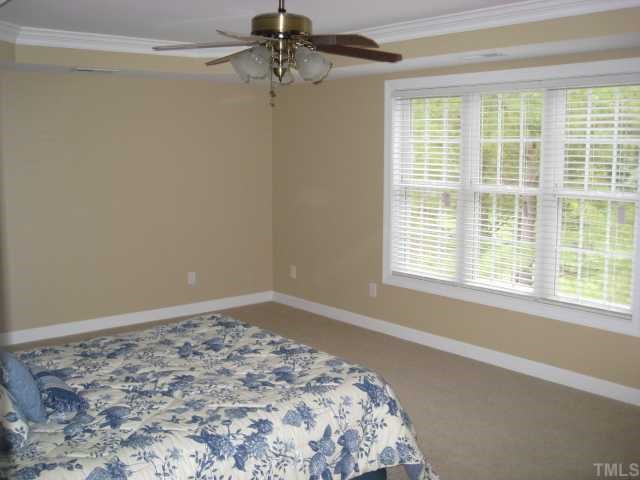 2912 Candlehurst Lane Raleigh, NC 27616 - Photo 7 of 12 a view of a big room with a window