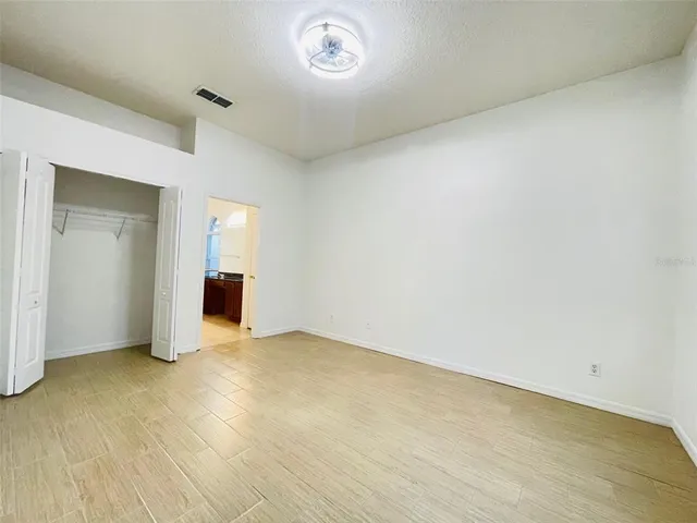 a kitchen with a sink and a refrigerator