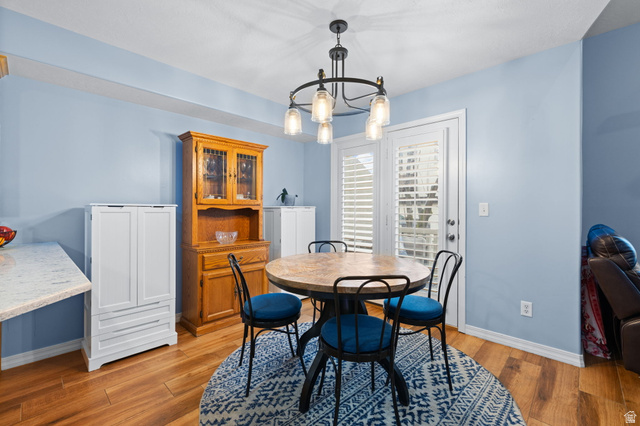 1625 Pages Pl Drive Bountiful, UT 84010 - Photo 11 of 31 Dining area with ceramic wood tile floors and upgraded lighting
