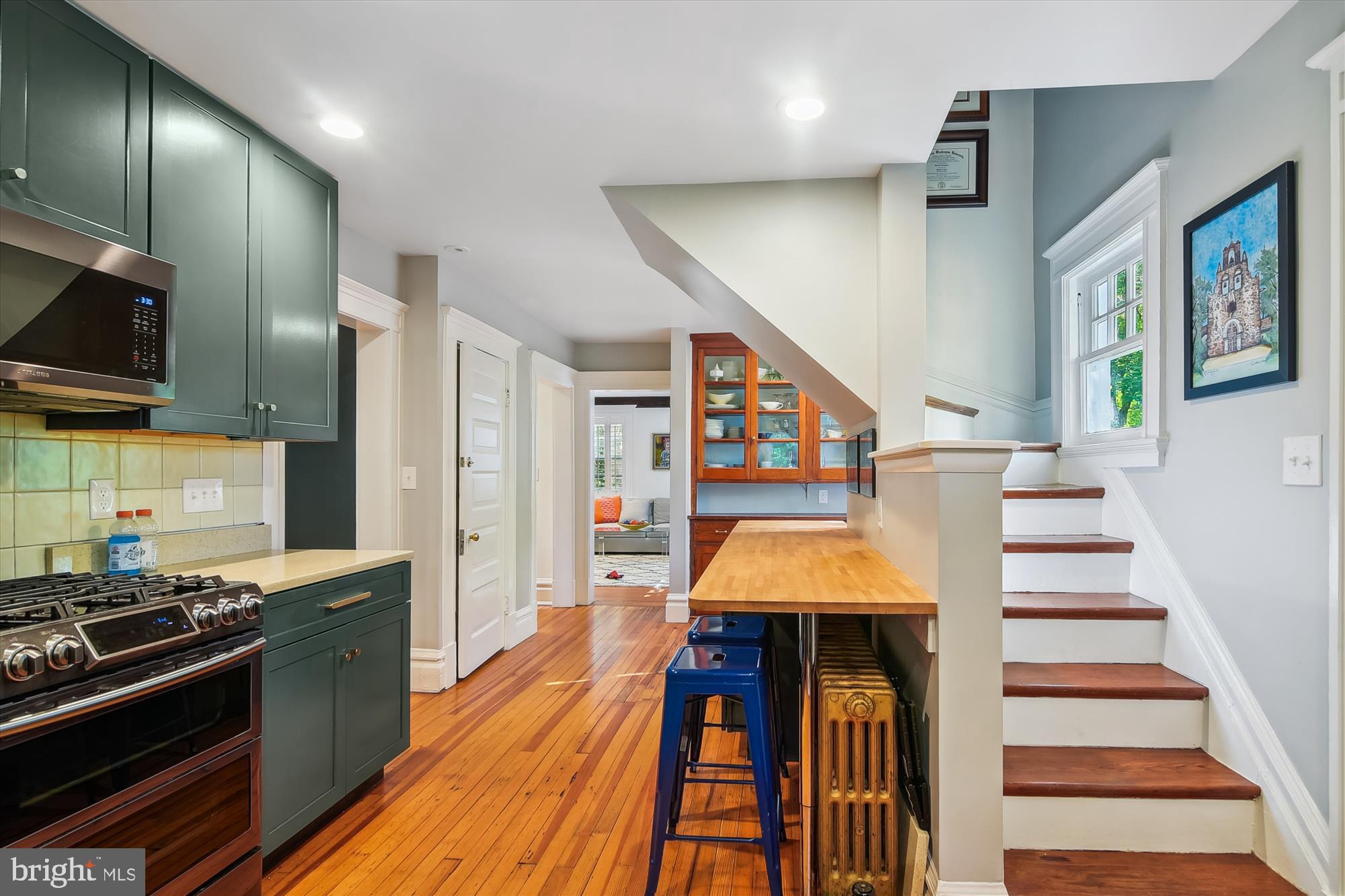 208 Edgevale Road Baltimore, MD 21210 - Photo 19 of 69 a kitchen with stainless steel appliances granite countertop a stove a sink and a refrigerator