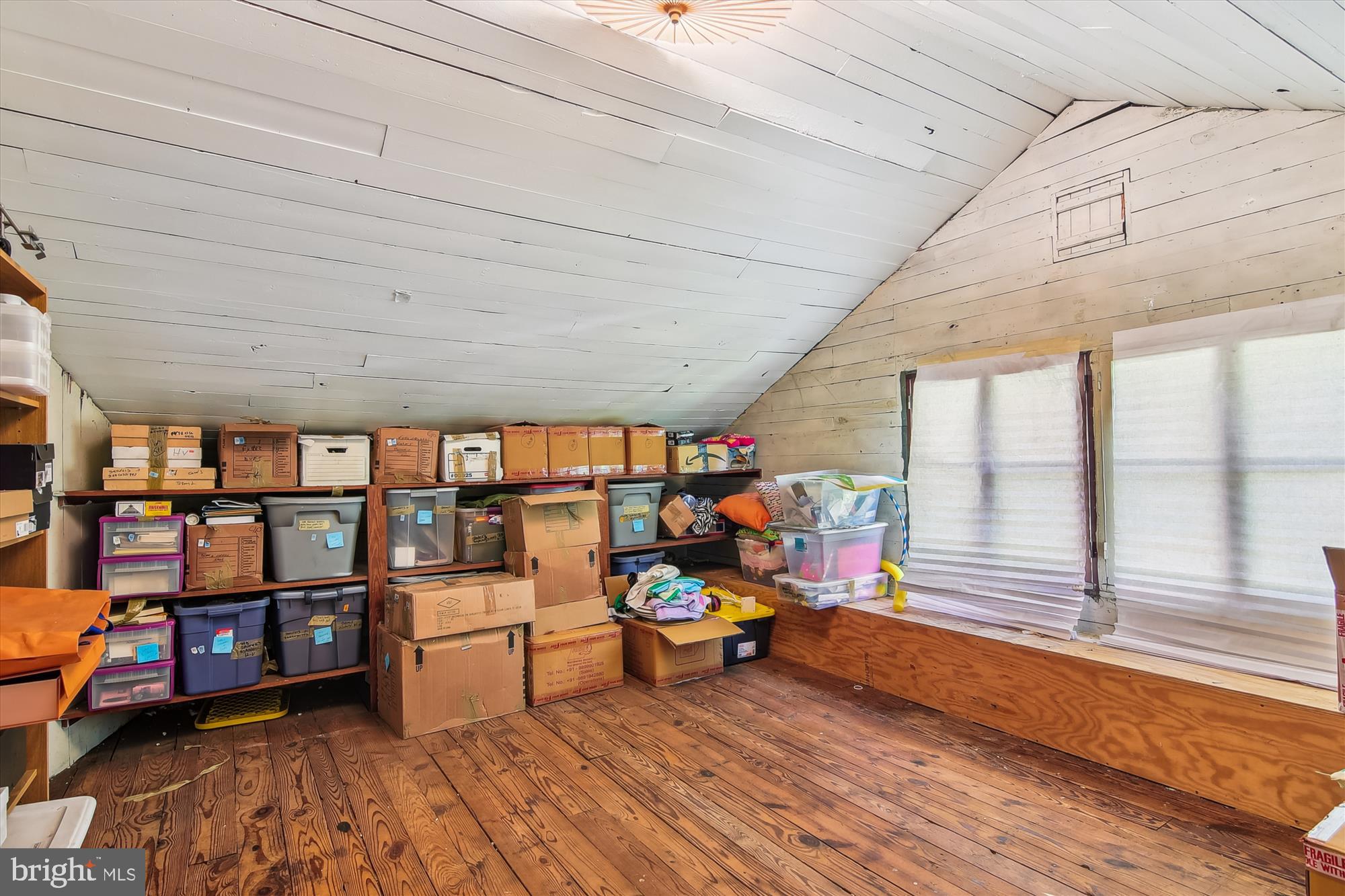 208 Edgevale Road Baltimore, MD 21210 - Photo 47 of 69 a living room filled with furniture and a book shelf
