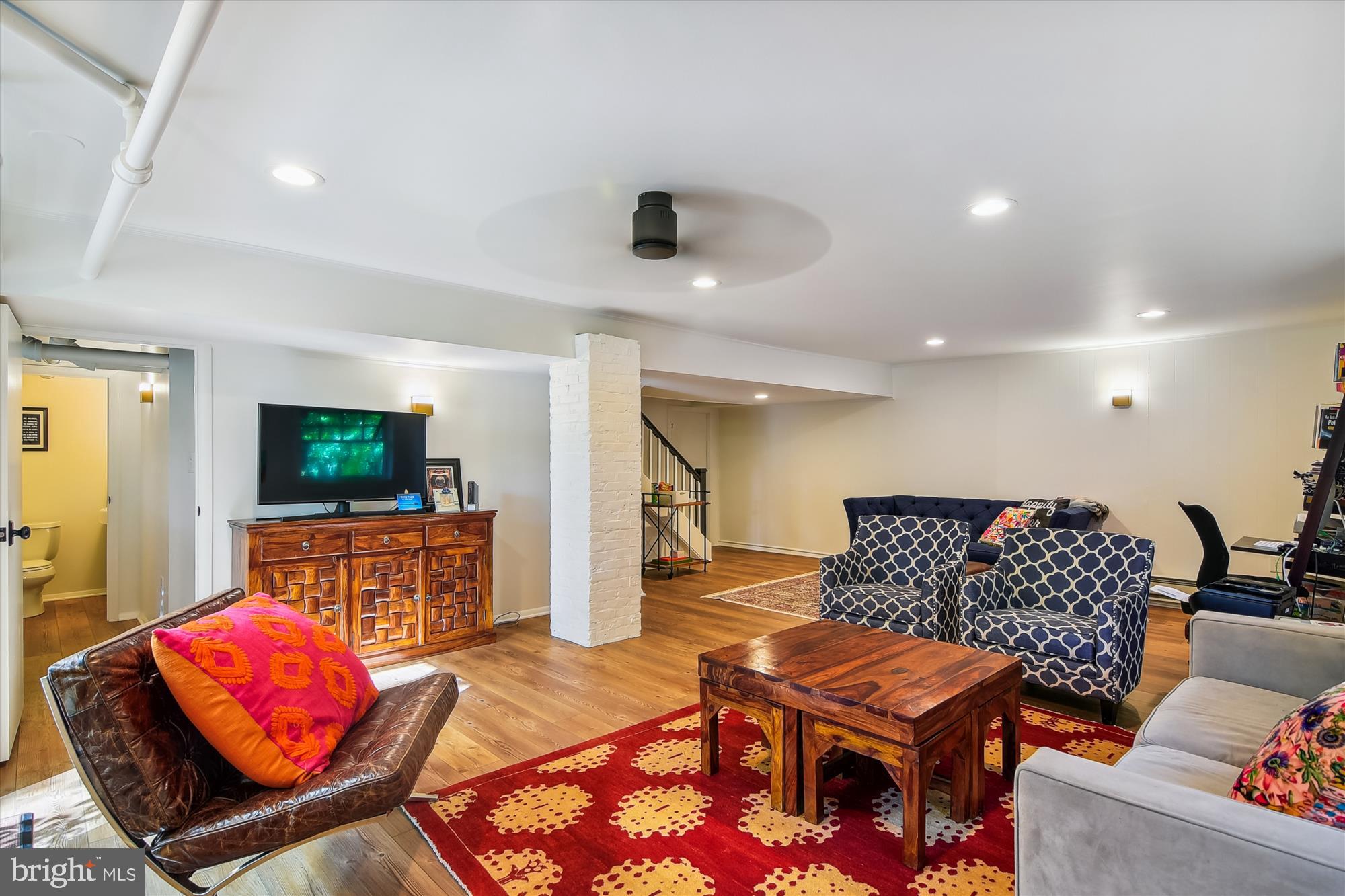 208 Edgevale Road Baltimore, MD 21210 - Photo 49 of 69 a living room with furniture and a flat screen tv