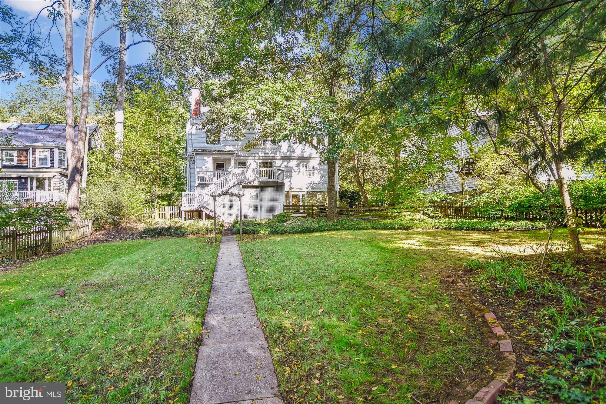 208 Edgevale Road Baltimore, MD 21210 - Photo 57 of 69 a view of a yard with plants and large trees