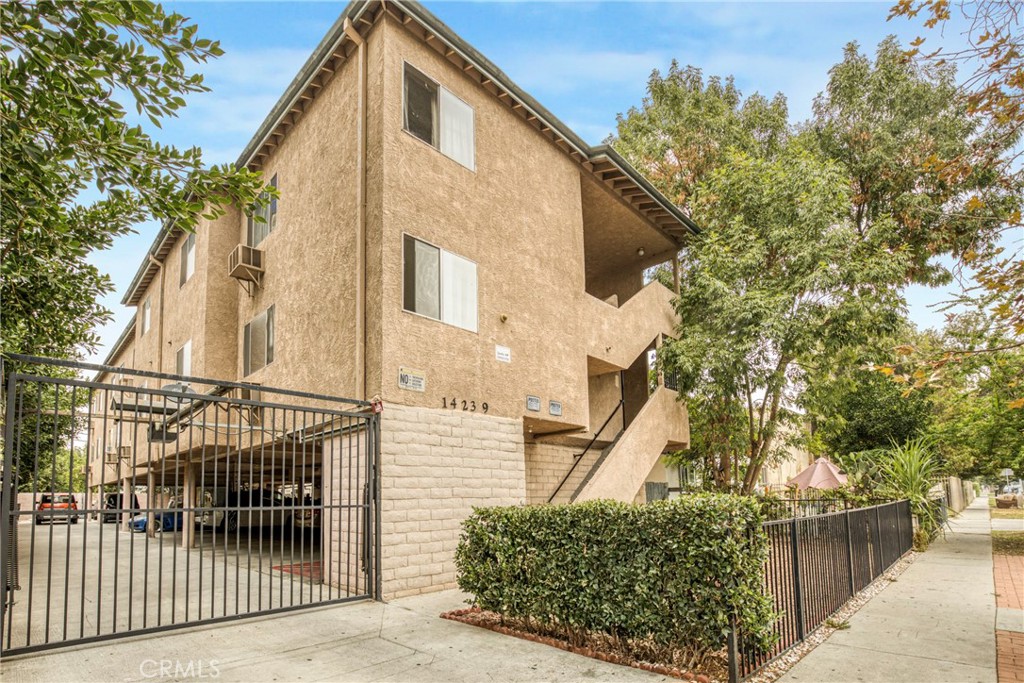 14239 Gilmore Street Van Nuys, CA 91401 - Photo 1 of 1 a view of a house with a tree