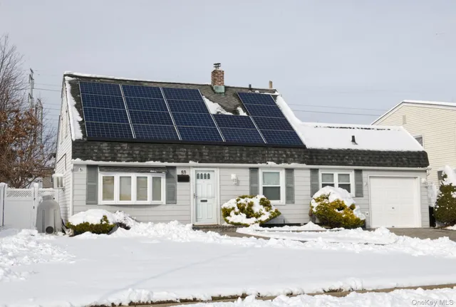 a front view of a house with a outdoor space