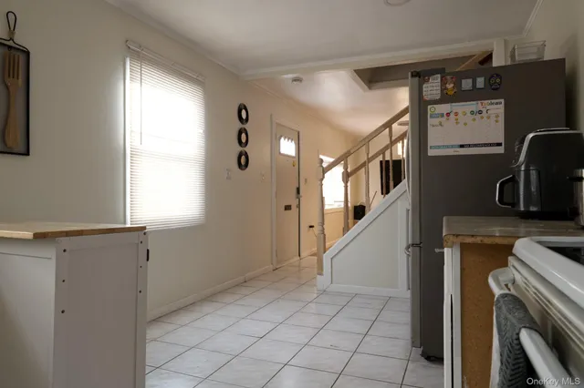 a room with a bed and a chair