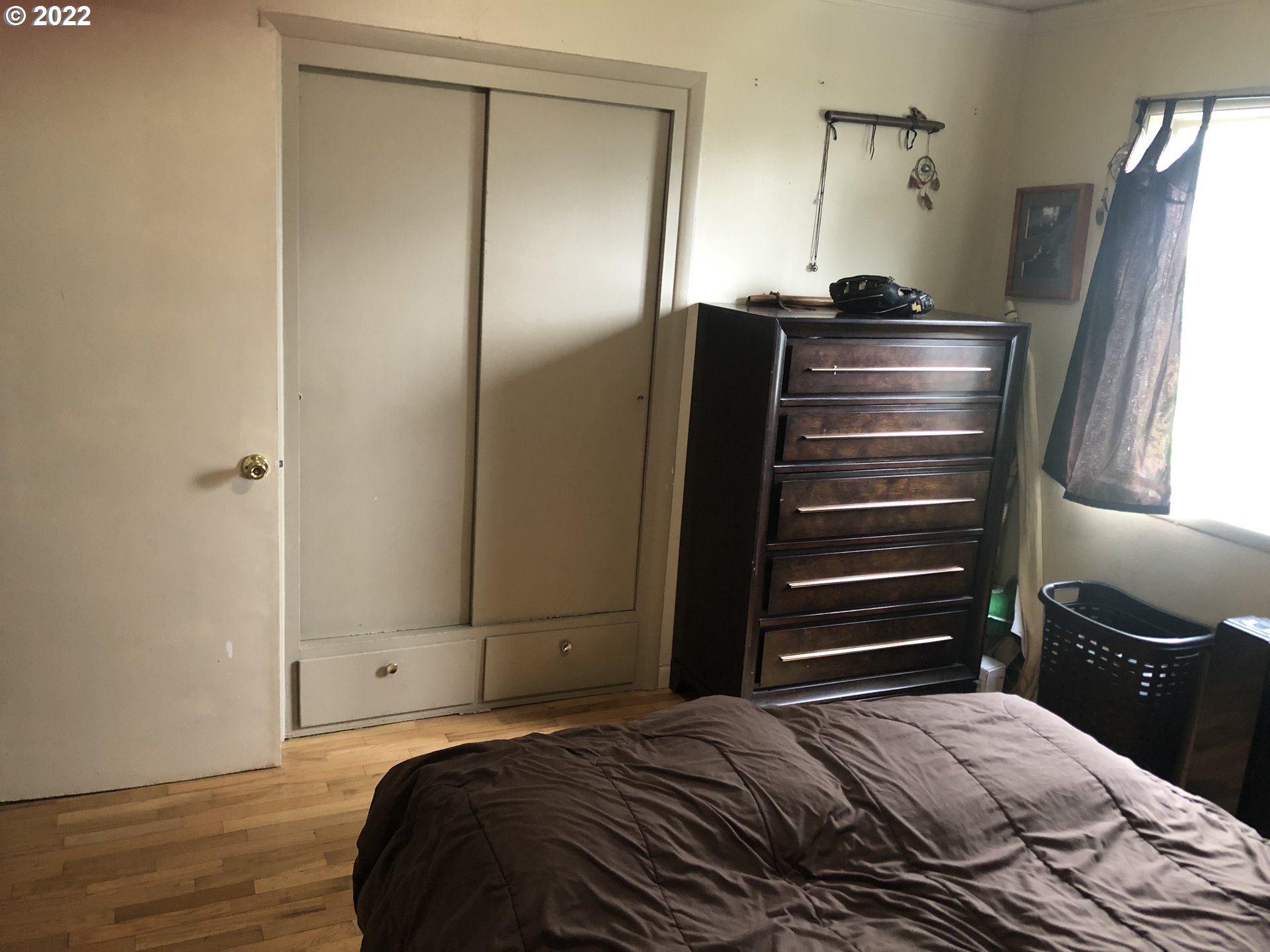 2796 J Street Springfield, OR 97477 - Photo 15 of 18 a bedroom with a bed dresser and a window