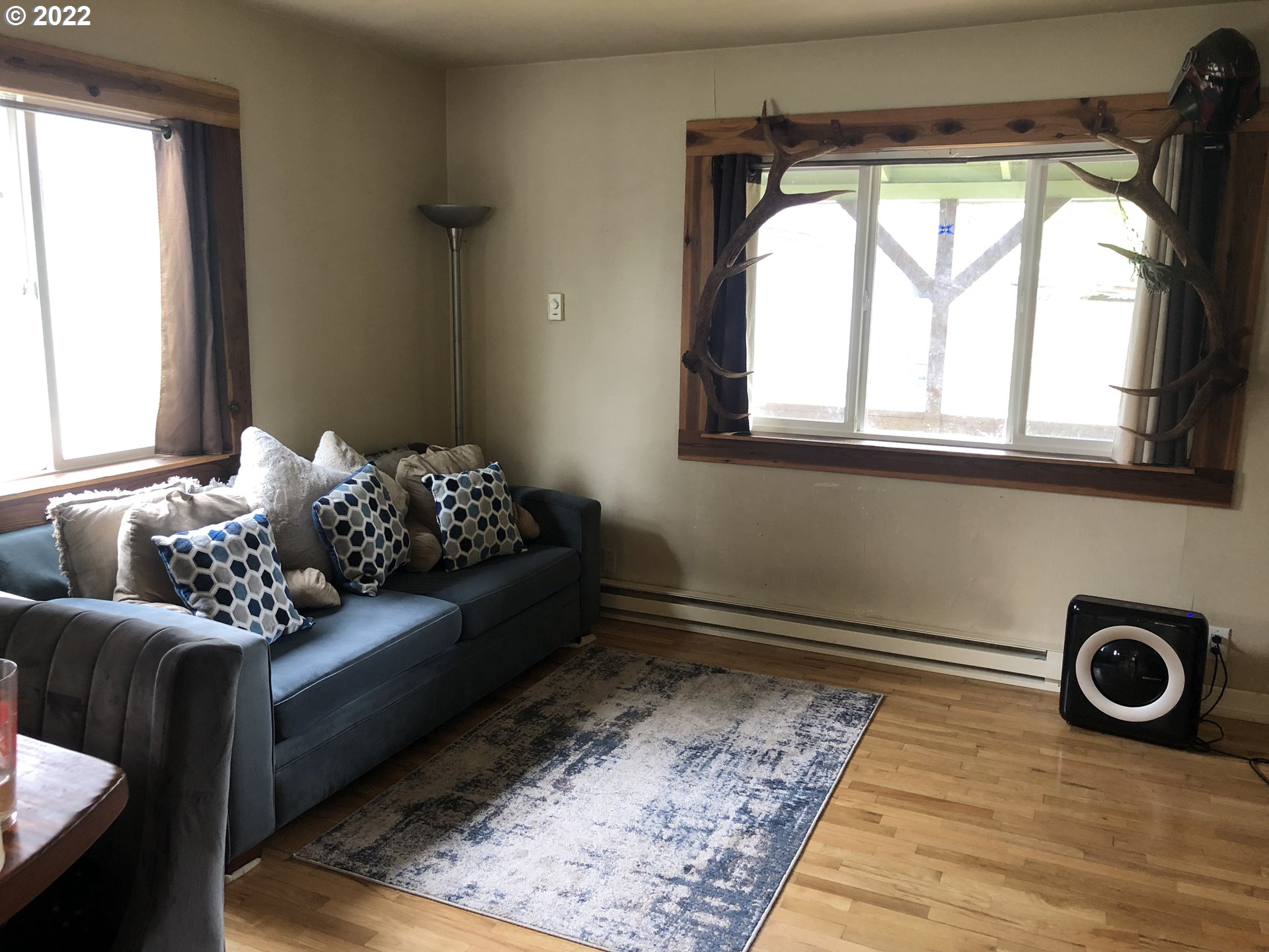 2796 J Street Springfield, OR 97477 - Photo 2 of 18 a bed sitting in a bedroom next to a window
