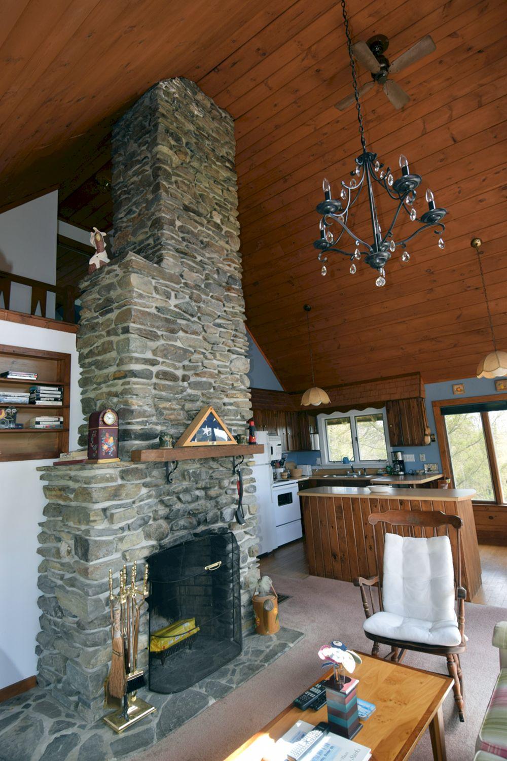 288 Chicken Street Starks, ME 04911 - Photo 16 of 50 2nd floor living room fireplace (2)