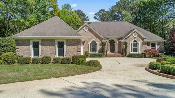 front view of a house and a yard