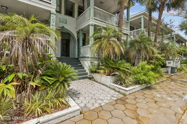 a view of a potted plants in front of house