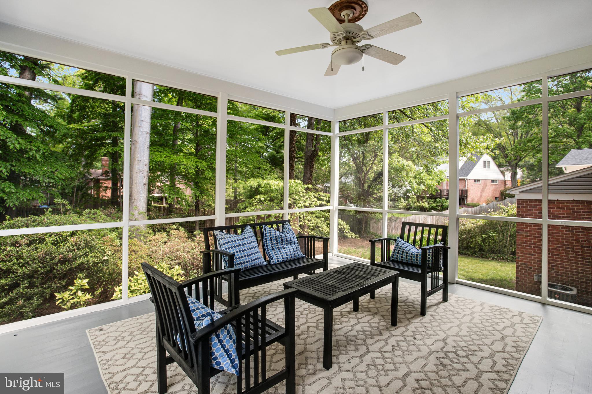 8802 Parliament Drive Springfield, VA 22151 - Photo 11 of 47 Relax with Coffee and a Book on Your Screen Porch