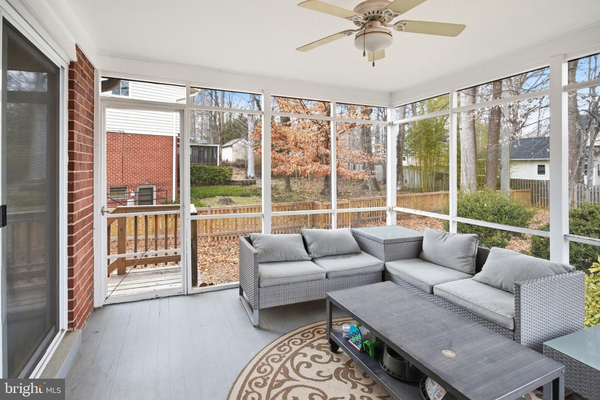8802 Parliament Drive Springfield, VA 22151 - Photo 12 of 47 Serene sunroom with nature views.