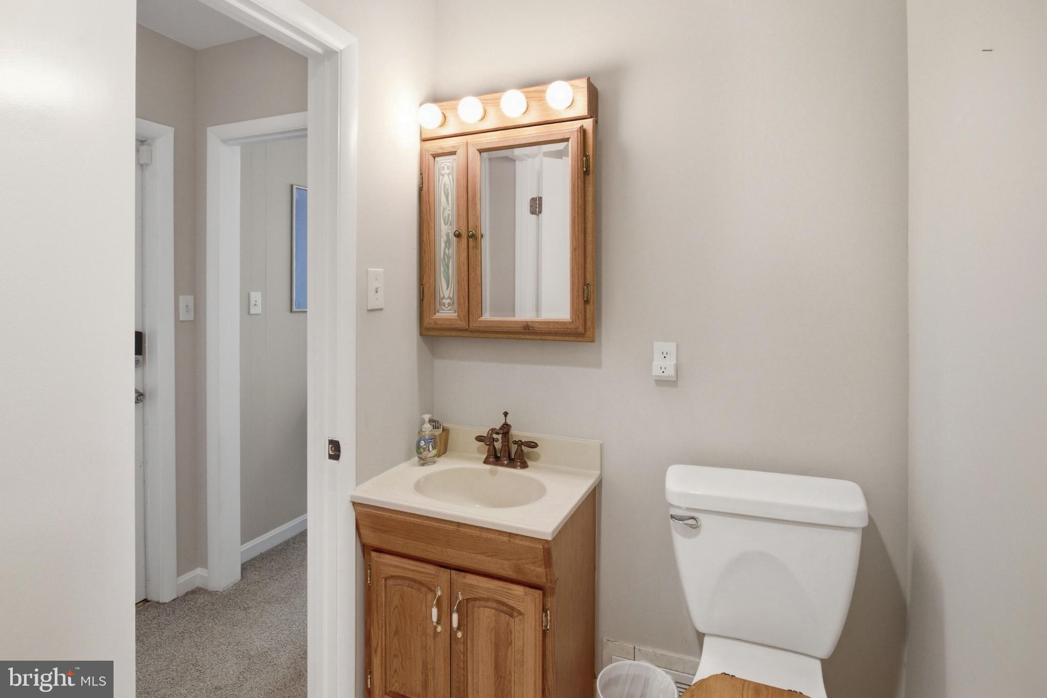 8802 Parliament Drive Springfield, VA 22151 - Photo 15 of 47 Charming bathroom with classic fixtures.