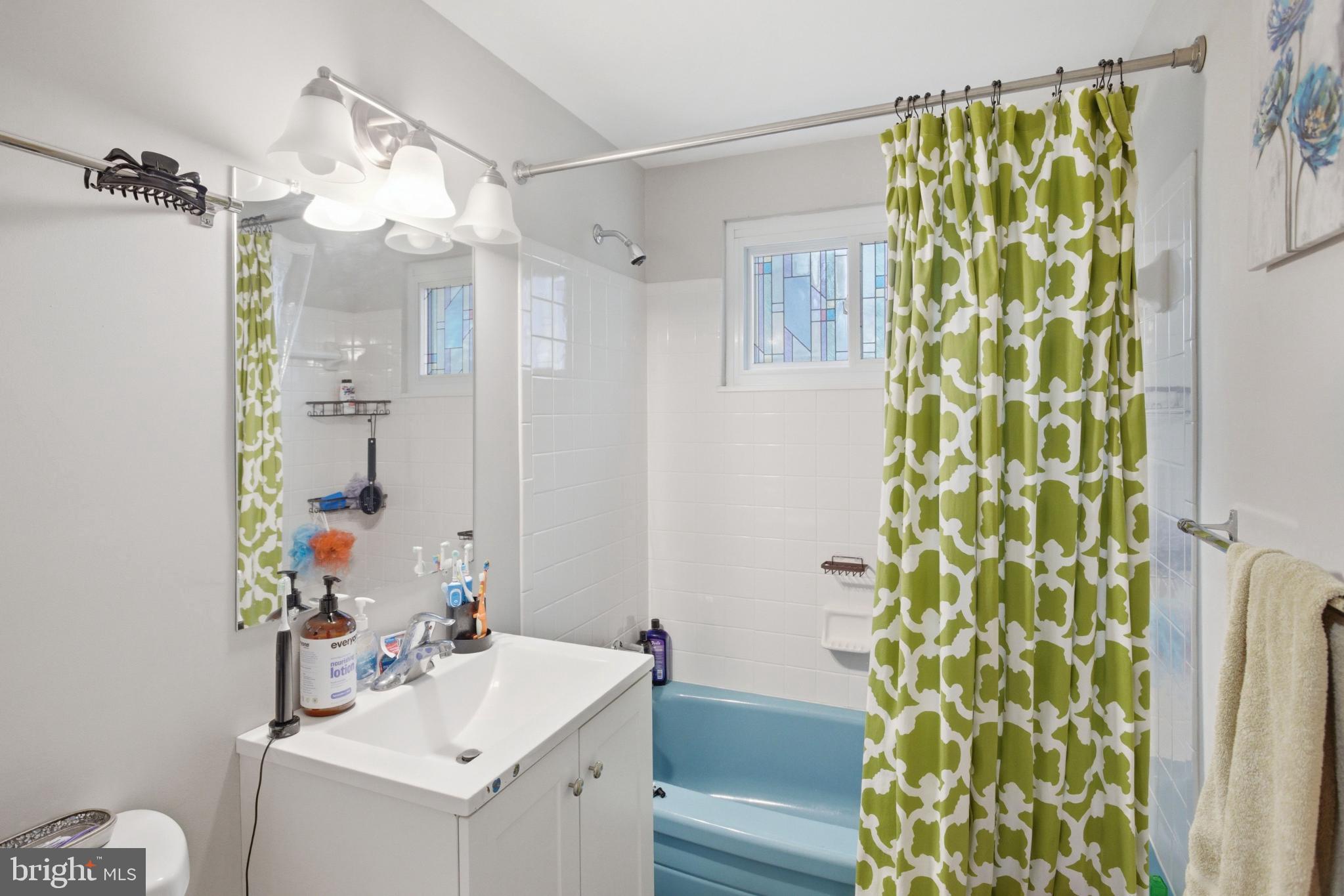 8802 Parliament Drive Springfield, VA 22151 - Photo 26 of 47 Bright and cheerful bathroom retreat.