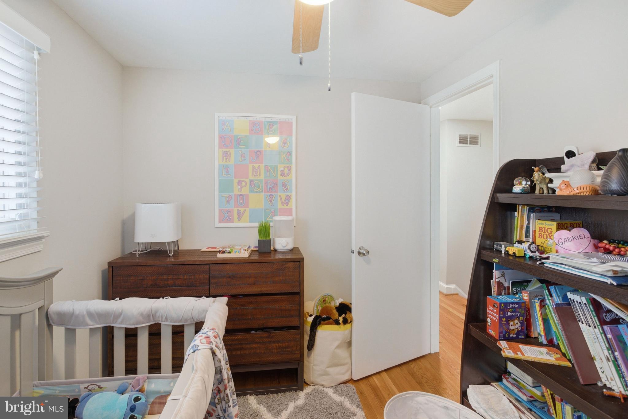 8802 Parliament Drive Springfield, VA 22151 - Photo 29 of 47 Bright and cheerful nursery with playful decor.