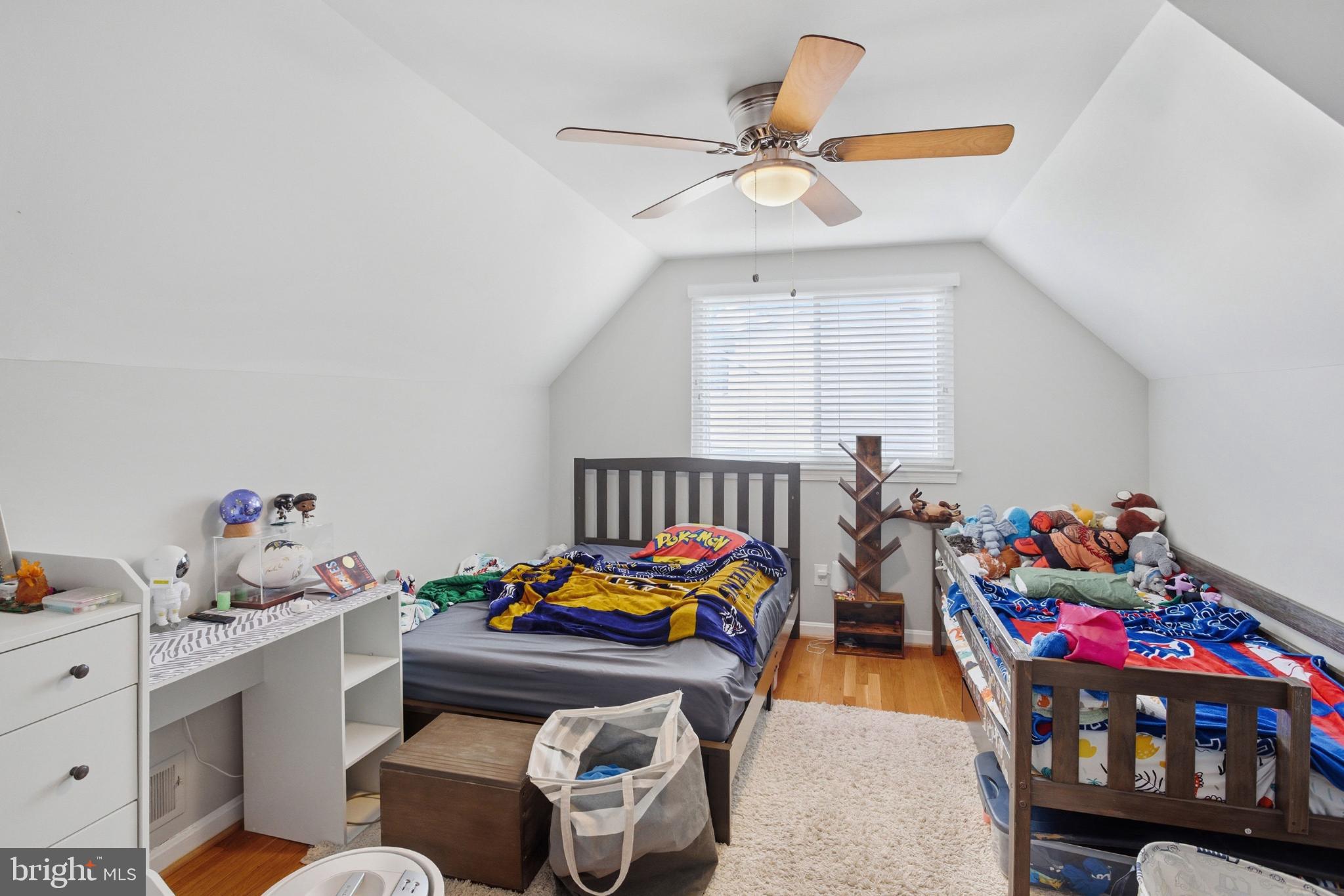 8802 Parliament Drive Springfield, VA 22151 - Photo 30 of 47 Cozy attic bedroom with playful charm.