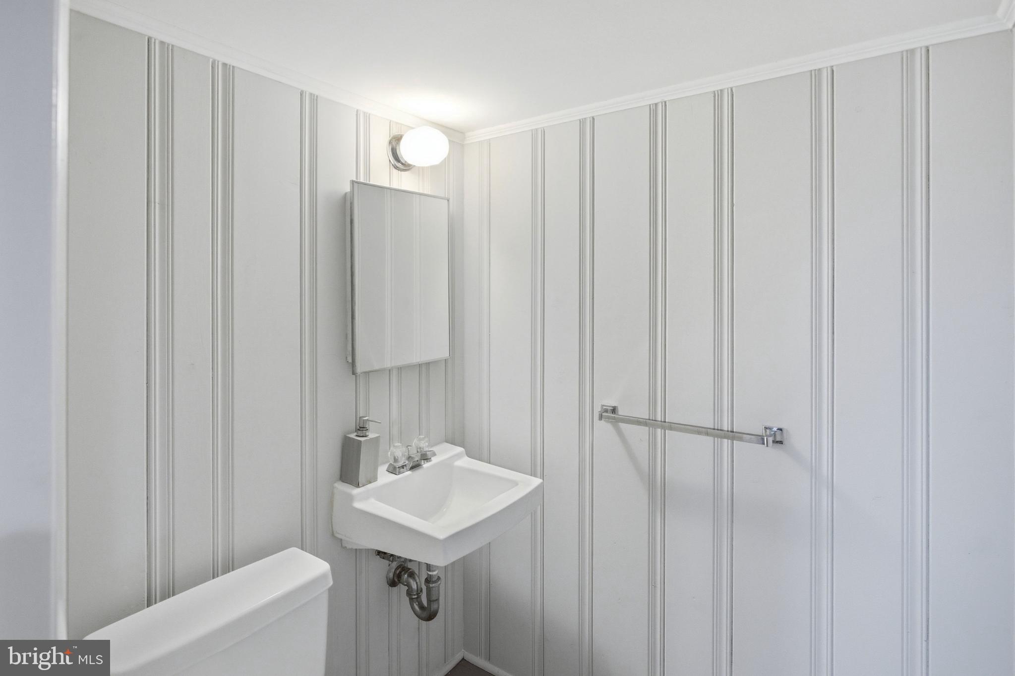 8802 Parliament Drive Springfield, VA 22151 - Photo 36 of 47 Sleek, modern bathroom with stylish stripes.