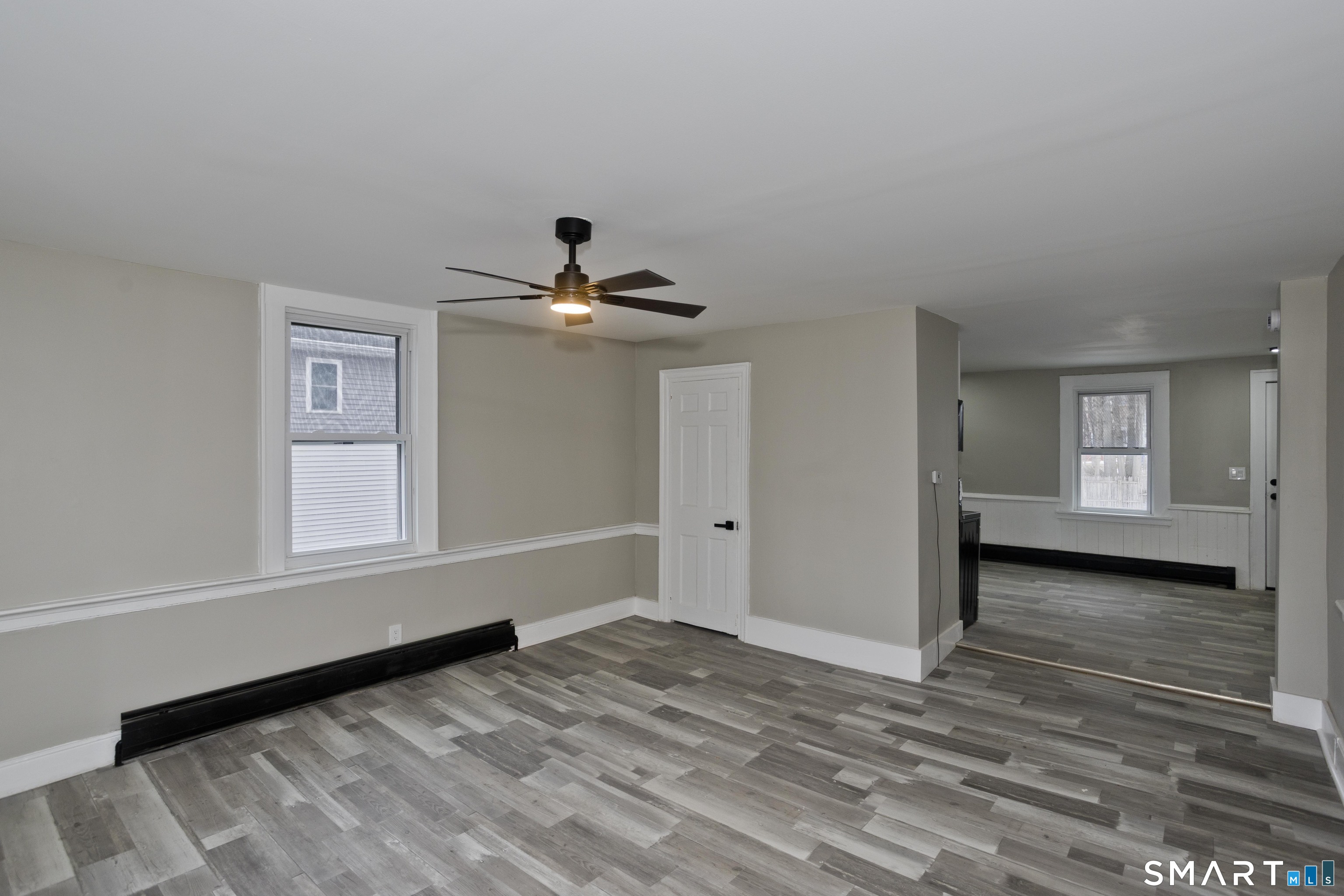 47 Maple Avenue Enfield, CT 06082 - Photo 11 of 37 a view of empty room with wooden floor