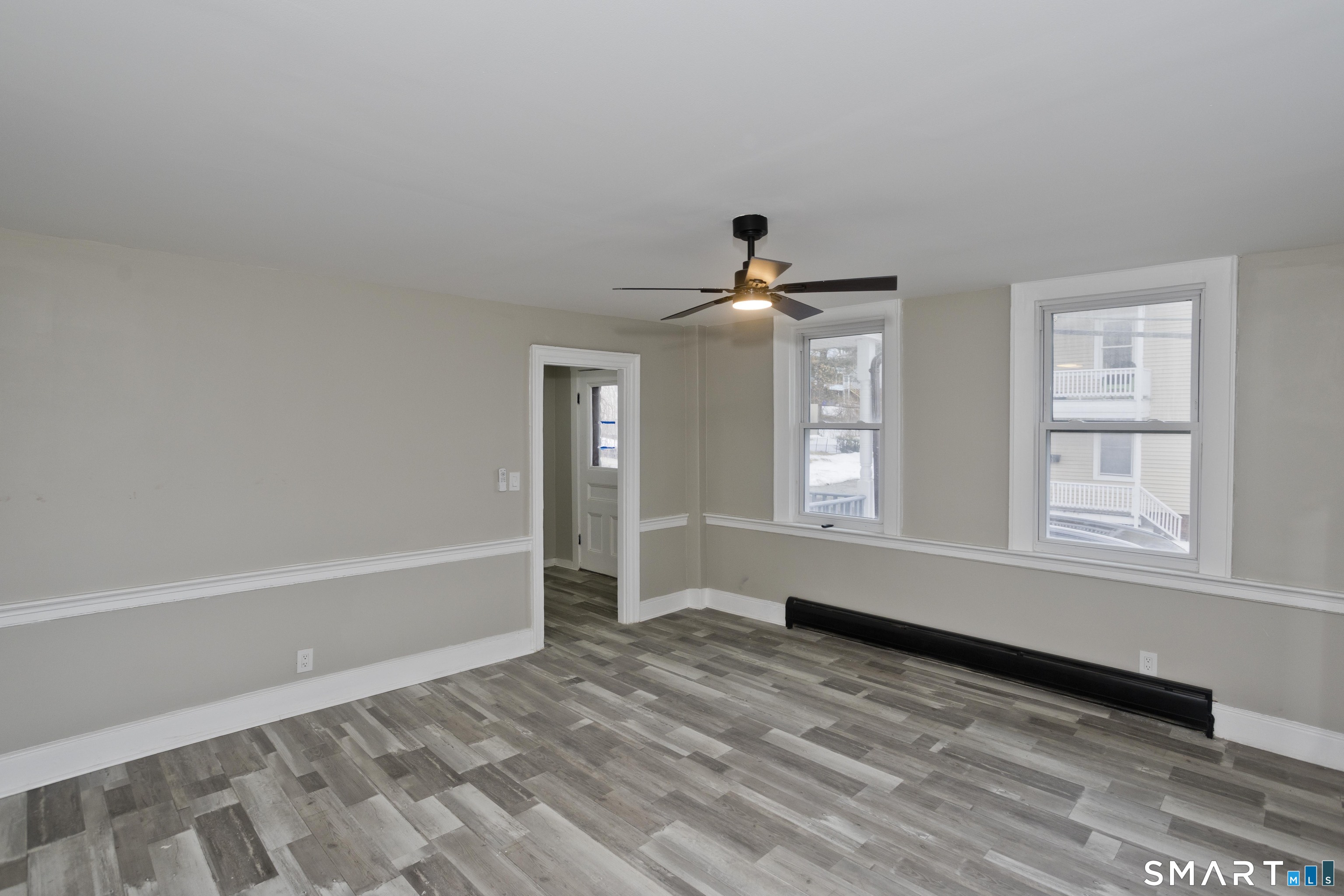 47 Maple Avenue Enfield, CT 06082 - Photo 12 of 36 a view of an empty room with a window