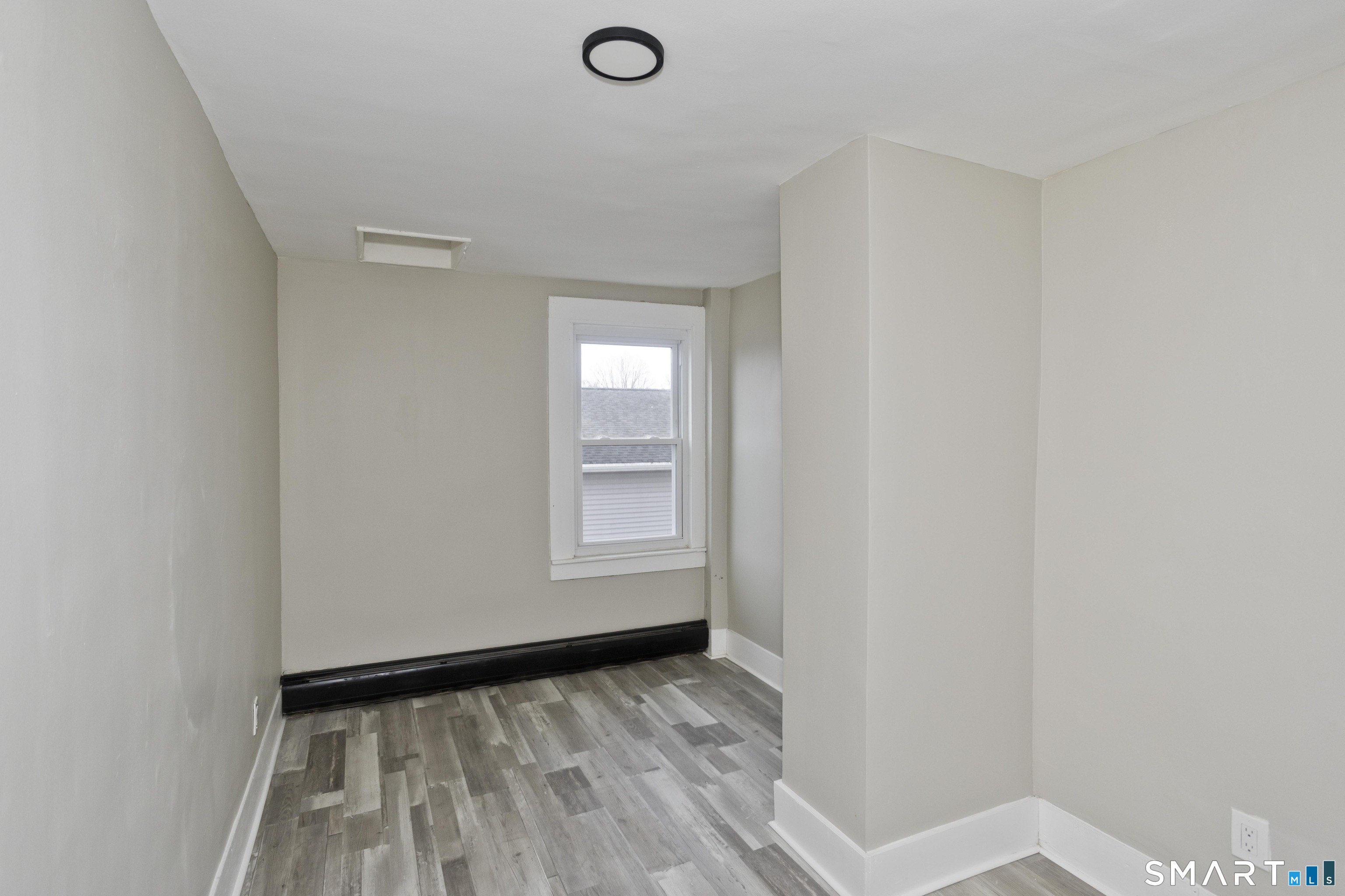 47 Maple Avenue Enfield, CT 06082 - Photo 15 of 36 a view of an empty room and window