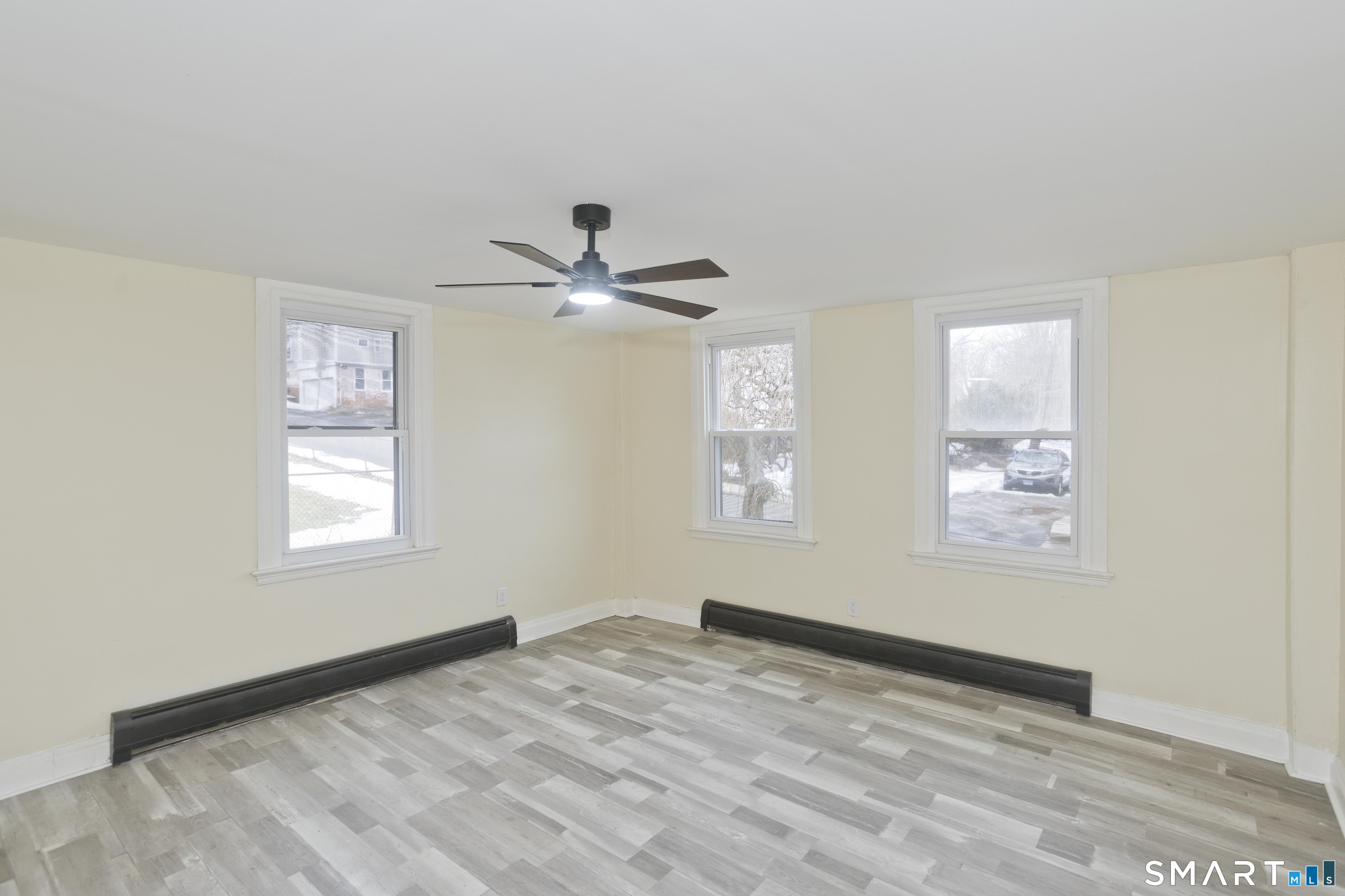 47 Maple Avenue Enfield, CT 06082 - Photo 31 of 37 a view of an empty room and window