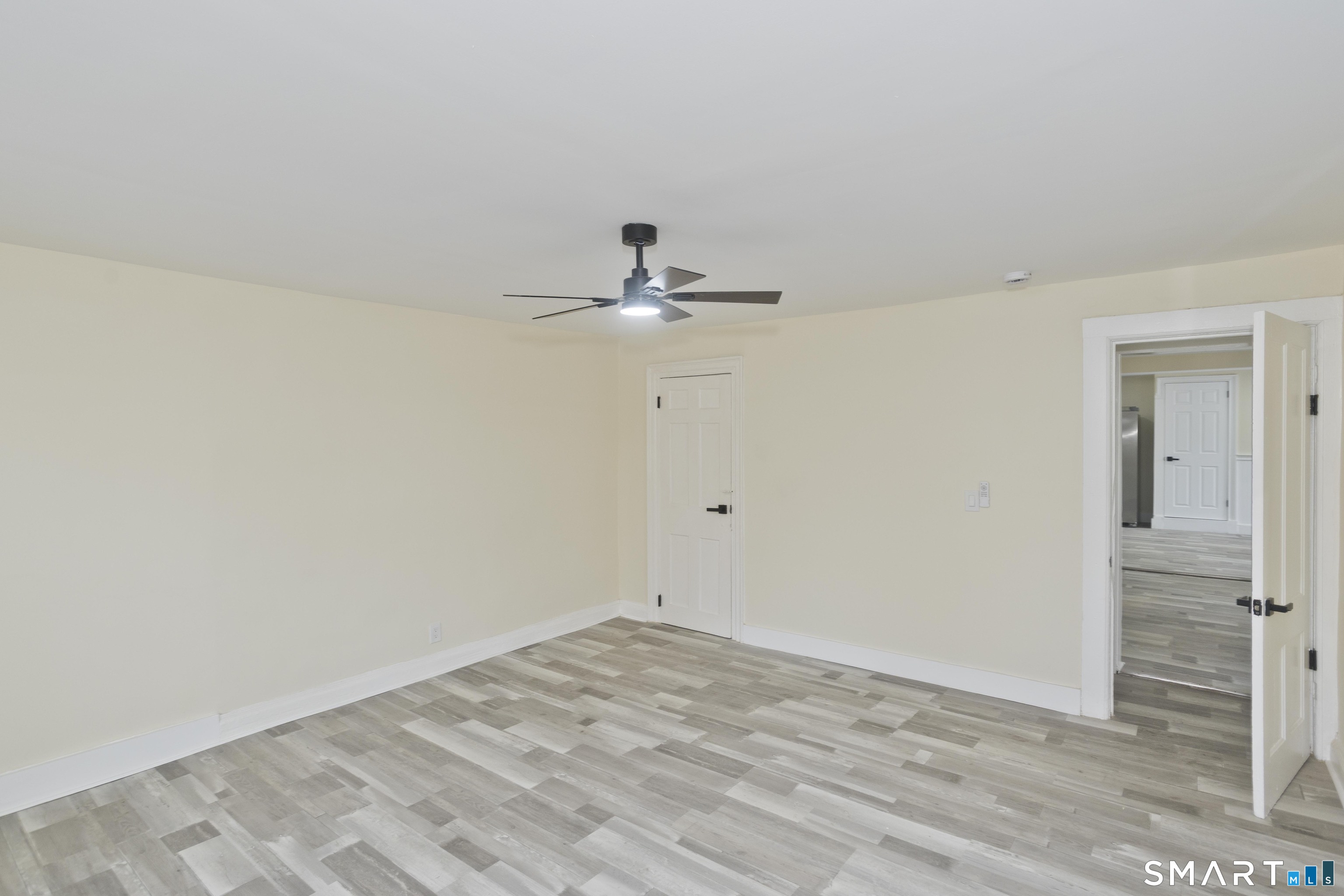 47 Maple Avenue Enfield, CT 06082 - Photo 32 of 37 a view of a room with wooden floor