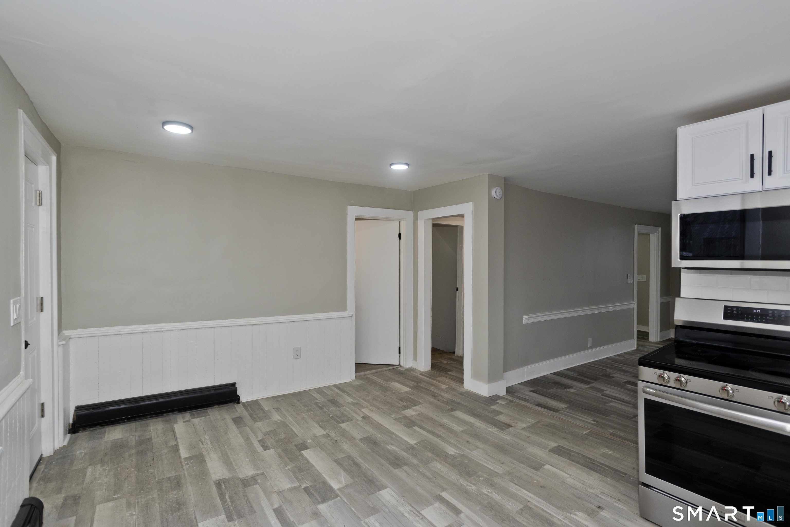 47 Maple Avenue Enfield, CT 06082 - Photo 8 of 37 a view of kitchen and wooden floor