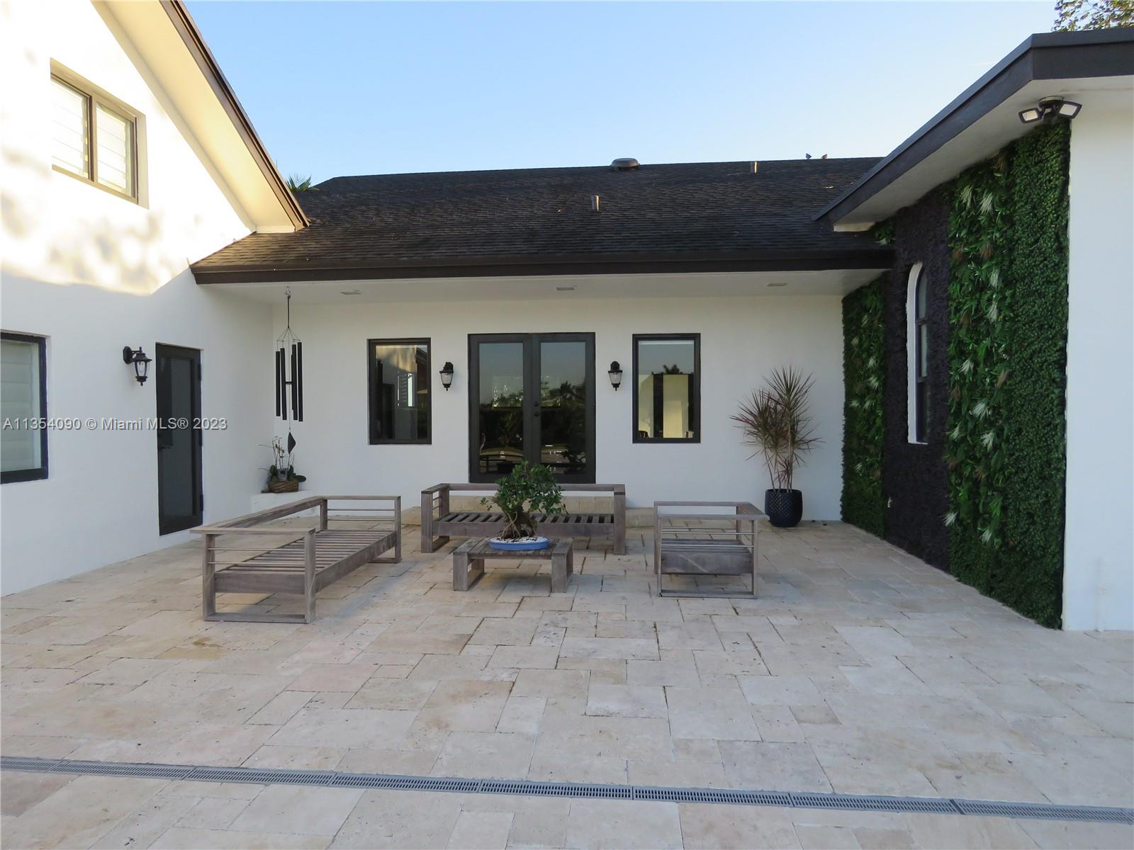 Redlands Homestead, FL 33031 - Photo 18 of 56 a outdoor space with patio furniture