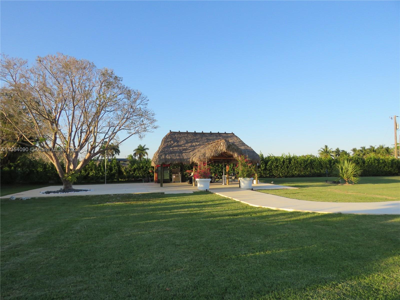 Redlands Homestead, FL 33031 - Photo 22 of 56 a view of a golf course with a lake