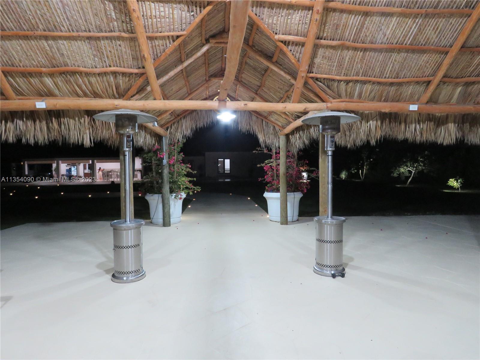 Redlands Homestead, FL 33031 - Photo 24 of 56 a view of a building with a tv