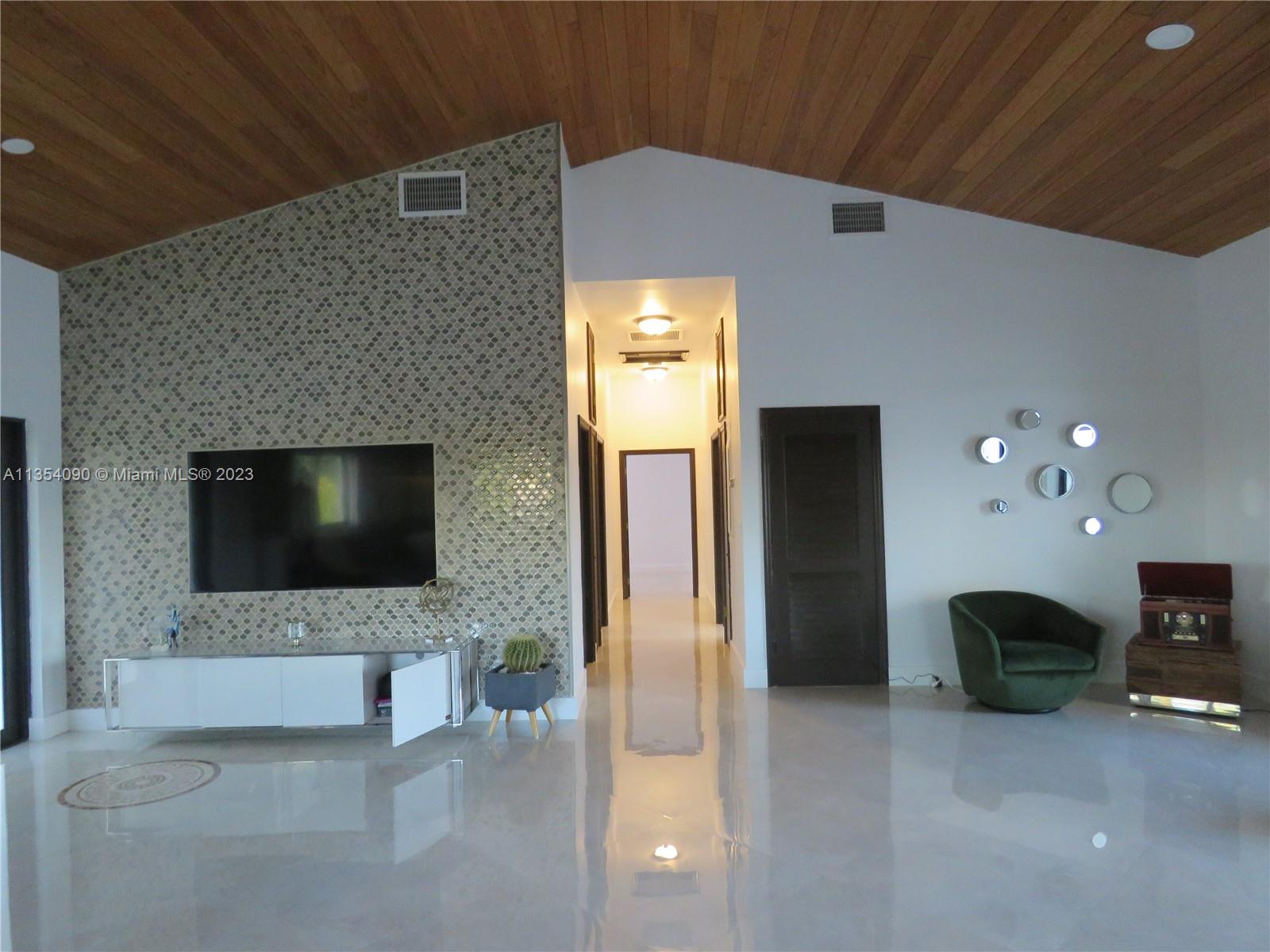 Redlands Homestead, FL 33031 - Photo 35 of 56 a view of an empty room with a fireplace